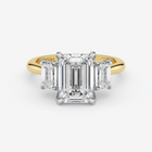 Gold and diamond ring with 'Graff' branding on a white background