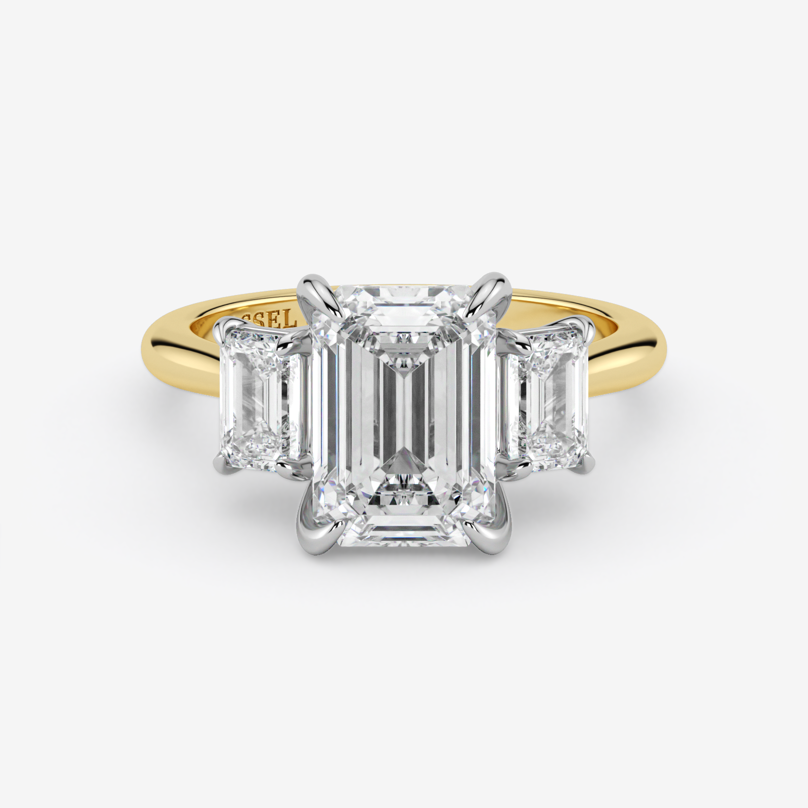 Gold and diamond ring with 'Graff' branding on a white background