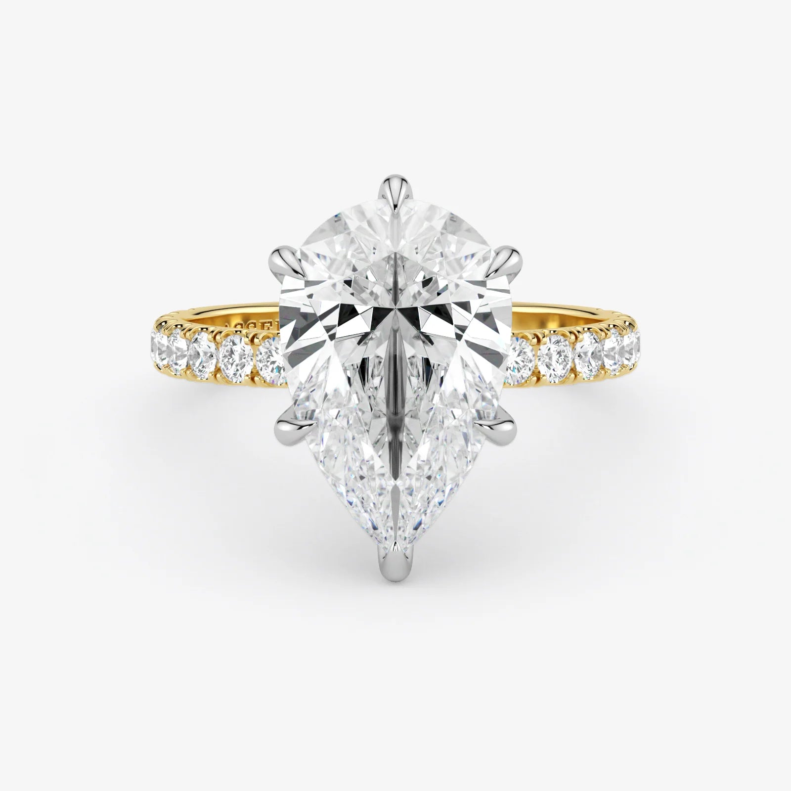 Gold and silver diamond ring on a white background