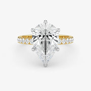 Gold and silver diamond ring on a white background