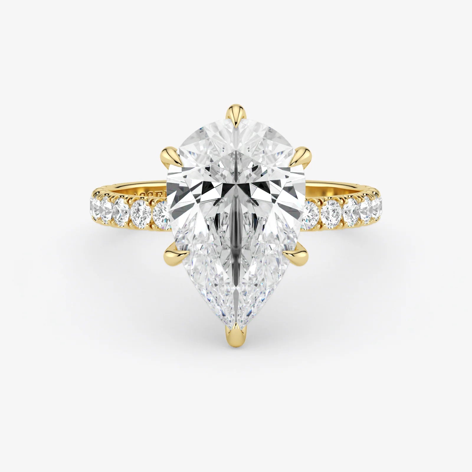 Gold and silver diamond ring on a white background