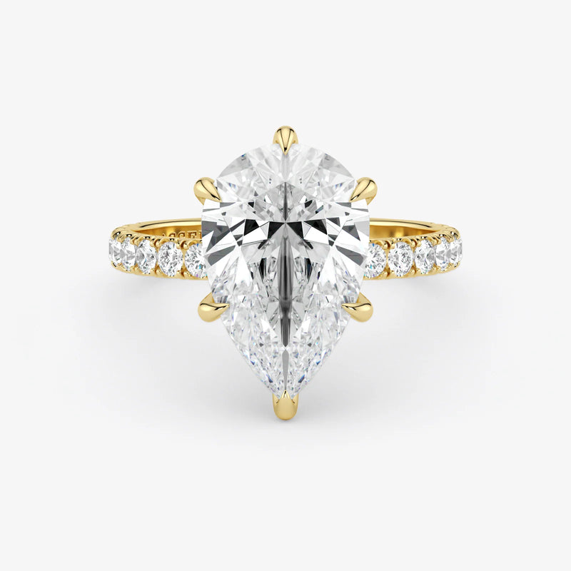 Gold and silver diamond ring on a white background
