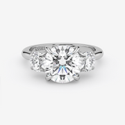 Diamond ring with 'Assael' branding on a white background
