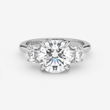 Diamond ring with 'Assael' branding on a white background