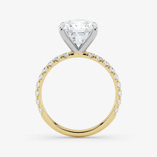 Gold ring with a diamond on a white background