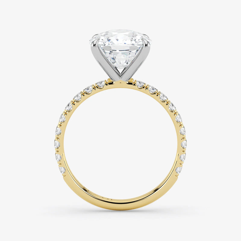 Gold ring with a diamond on a white background
