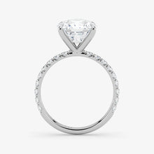 Diamond ring with a clear gemstone on a white background
