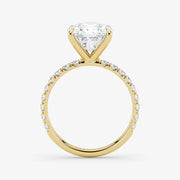 Gold ring with a diamond on a white background
