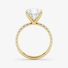 Gold ring with a diamond on a white background
