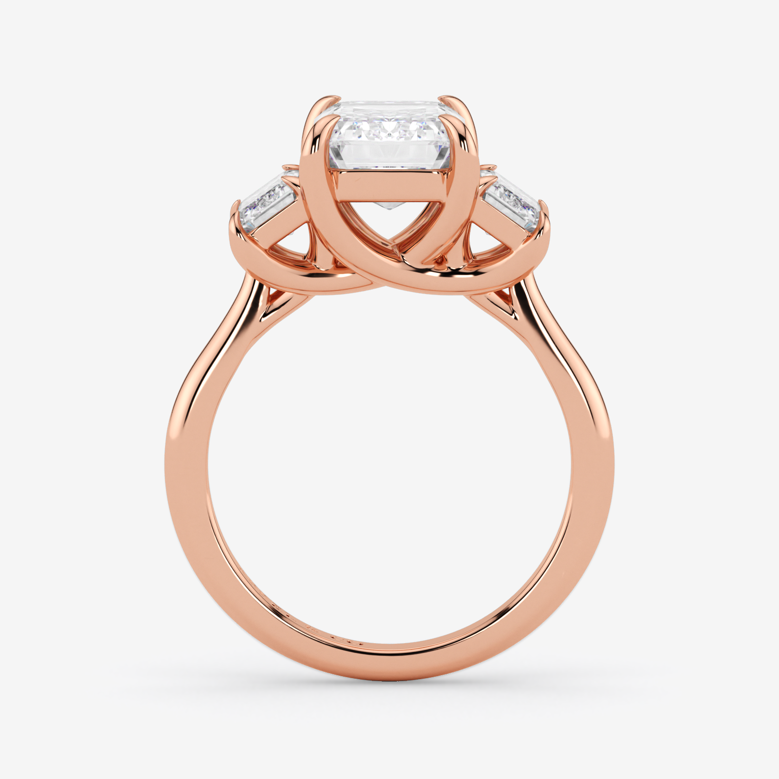 Rose gold ring with a diamond on a white background