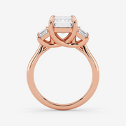 Rose gold ring with a diamond on a white background