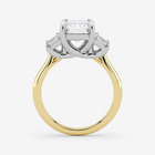 Two-tone gold ring with diamond accents on a white background