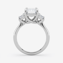 Silver ring with a diamond on a white background