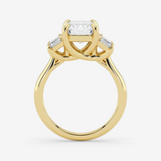 Gold ring with a diamond on a white background