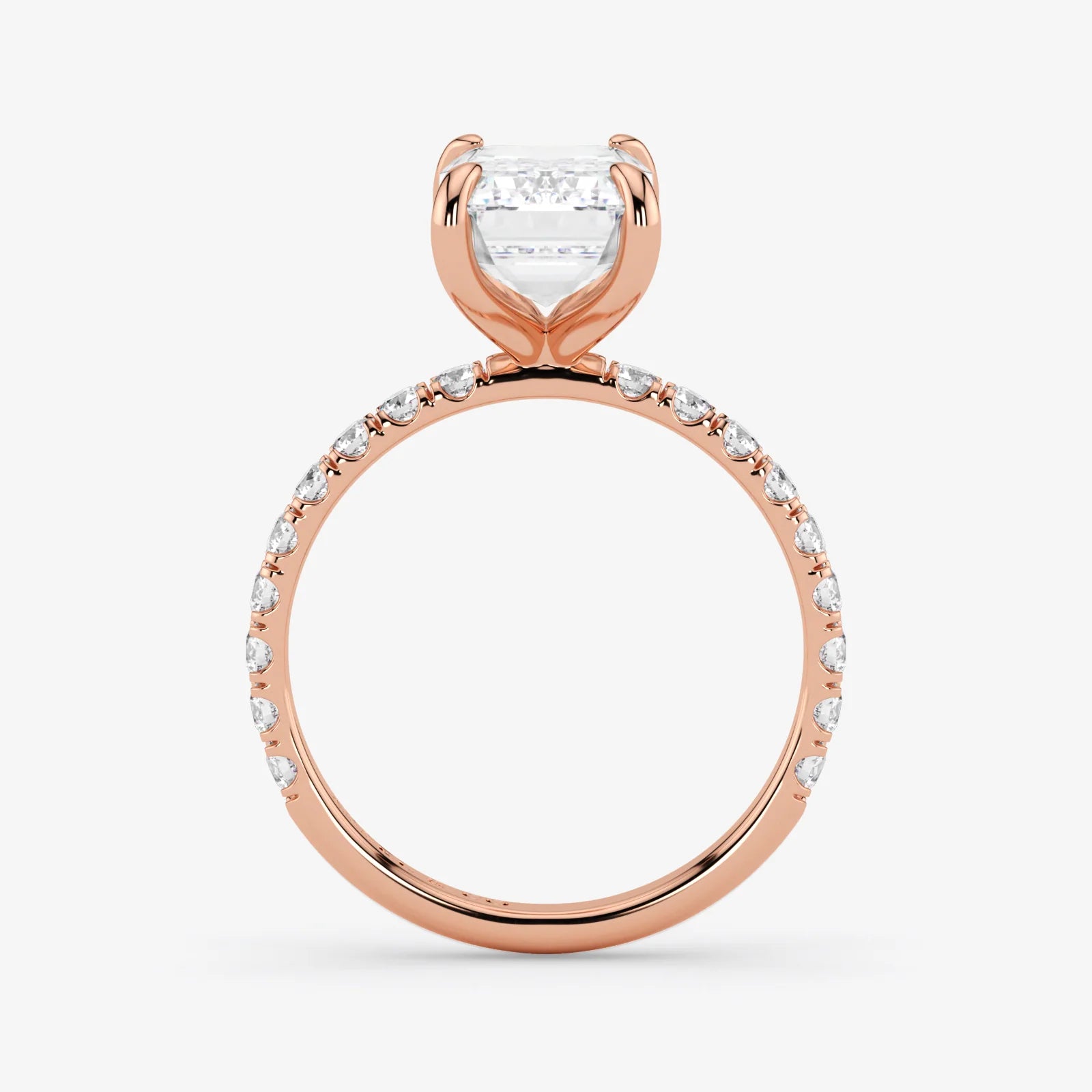 Rose gold ring with a diamond on a white background