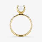 Gold ring with a diamond on a white background