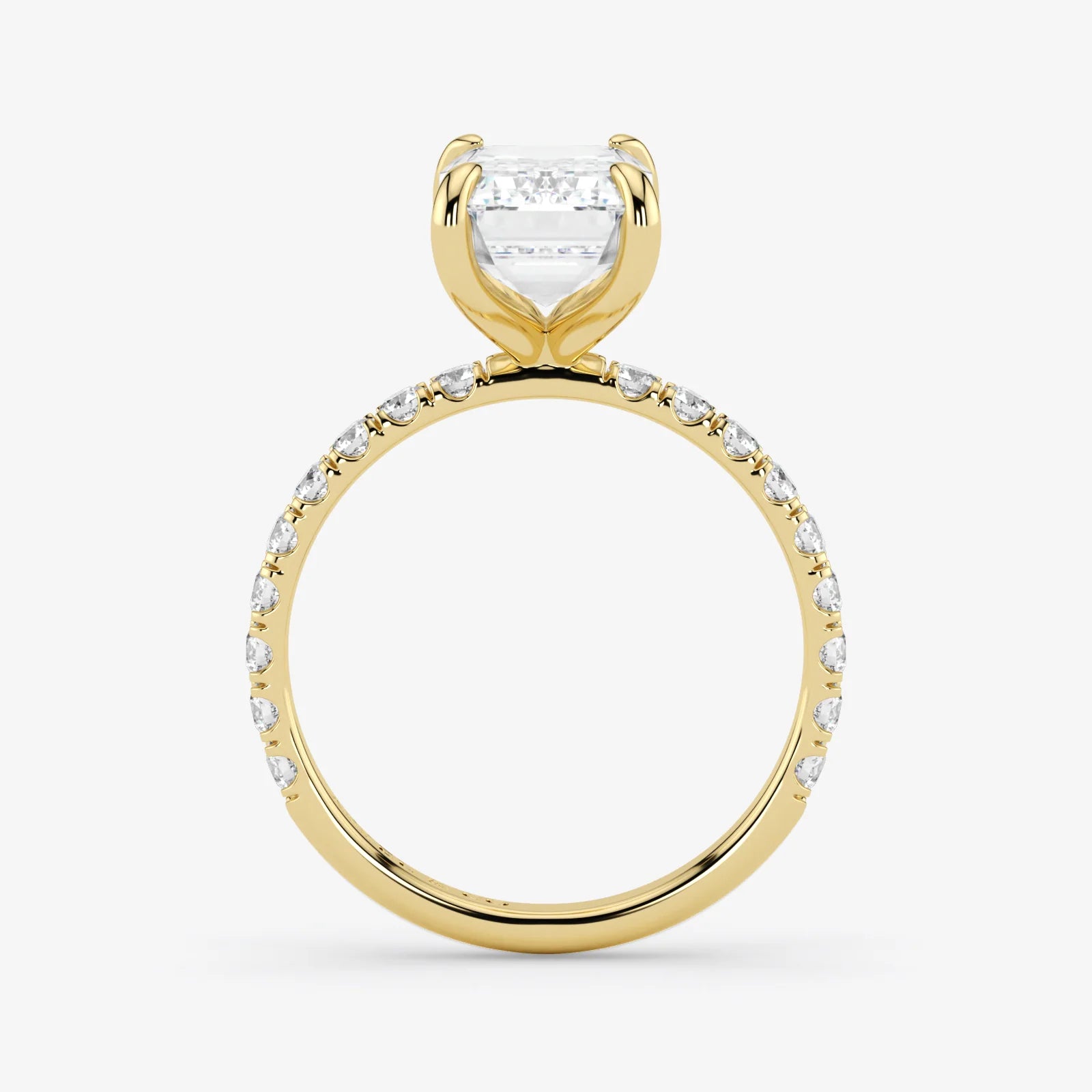 Gold ring with a diamond on a white background