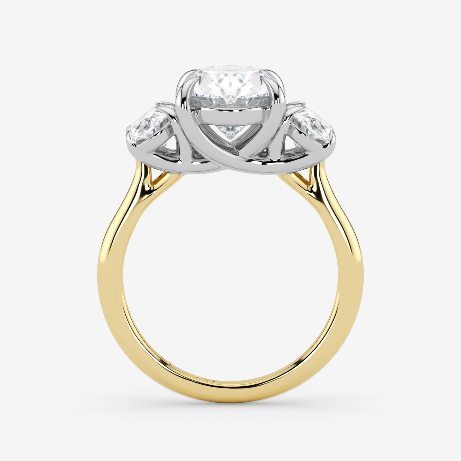 Two-tone gold ring with a diamond on a white background