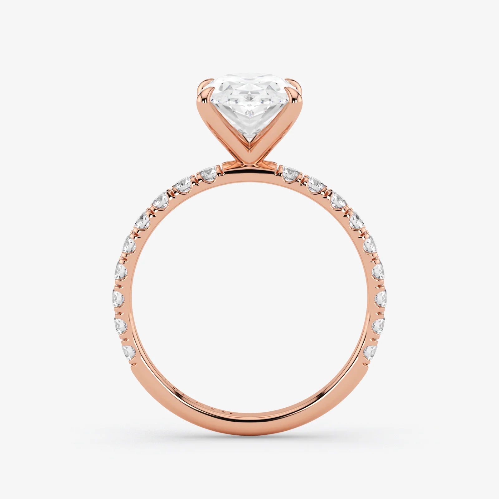 Rose gold ring with a diamond on a white background