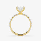 Gold ring with a diamond on a white background