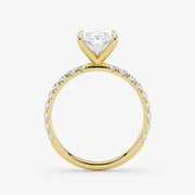 Gold ring with a diamond on a white background