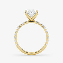 Gold ring with a diamond on a white background