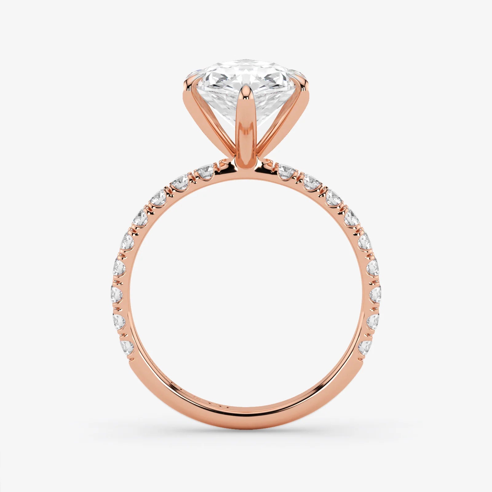 Rose gold ring with a diamond on a white background