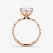 Rose gold ring with a diamond on a white background