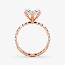 Rose gold ring with a diamond on a white background