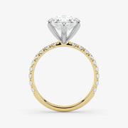Gold and silver diamond ring on a white background