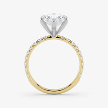 Gold and silver diamond ring on a white background