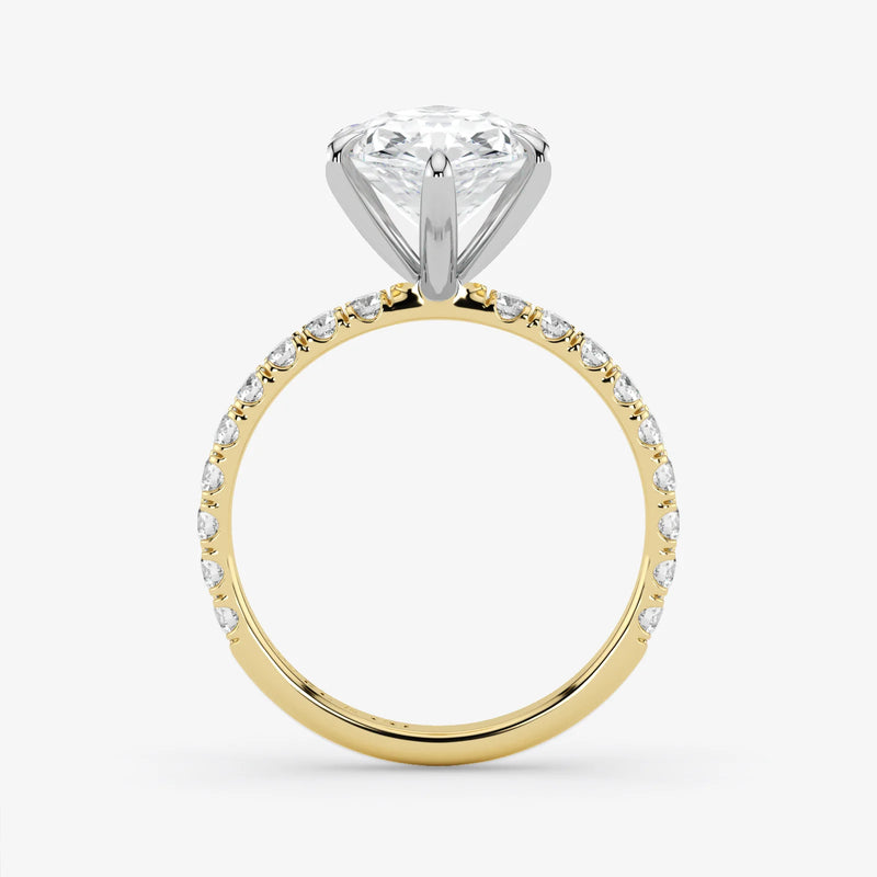 Gold and silver diamond ring on a white background