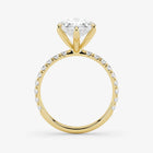 Gold ring with a diamond on a white background