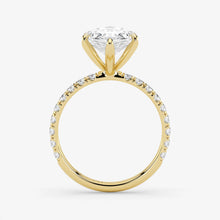 Gold ring with a diamond on a white background