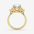 Gold ring with a diamond on a white background