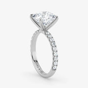 Diamond ring with a clear gemstone on a white background