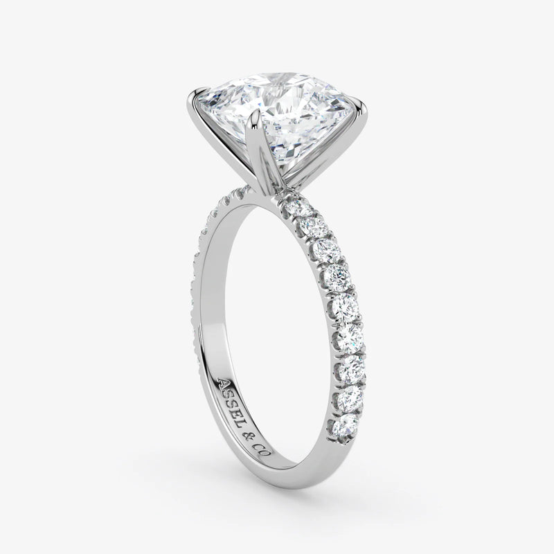 Diamond ring with a clear gemstone on a white background