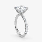 Diamond ring with a clear gemstone on a white background
