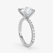 Diamond ring with a clear gemstone on a white background