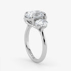 Silver ring with two diamonds on a white background