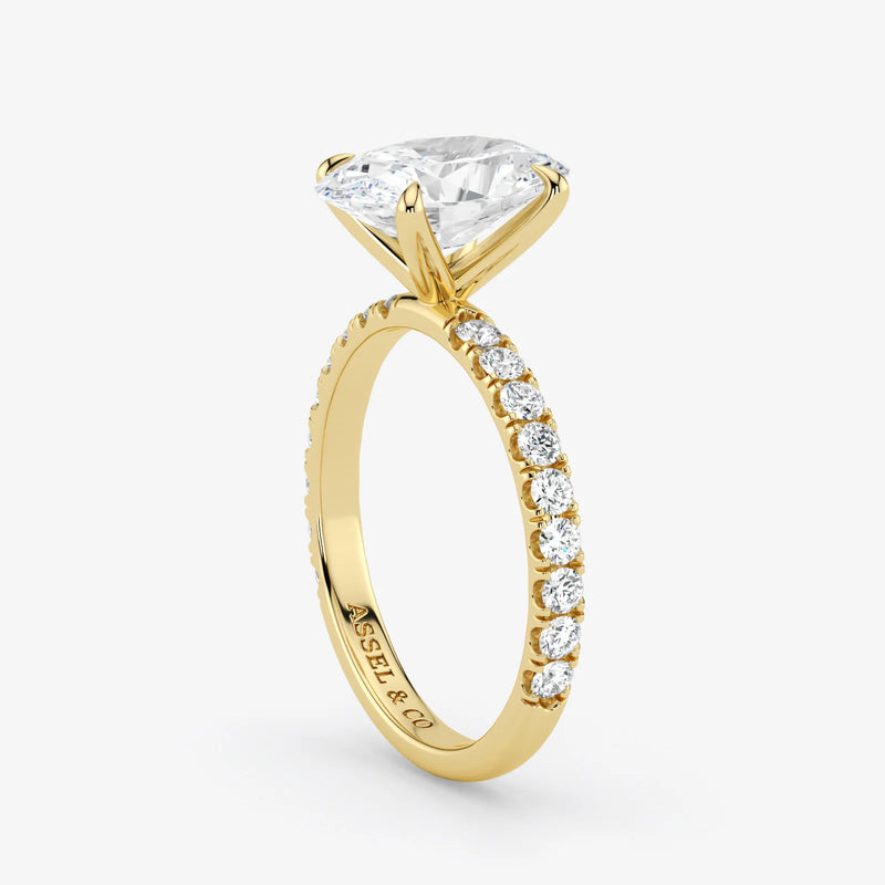 Gold ring with a diamond on a white background