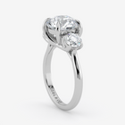 Silver ring with two diamonds on a white background