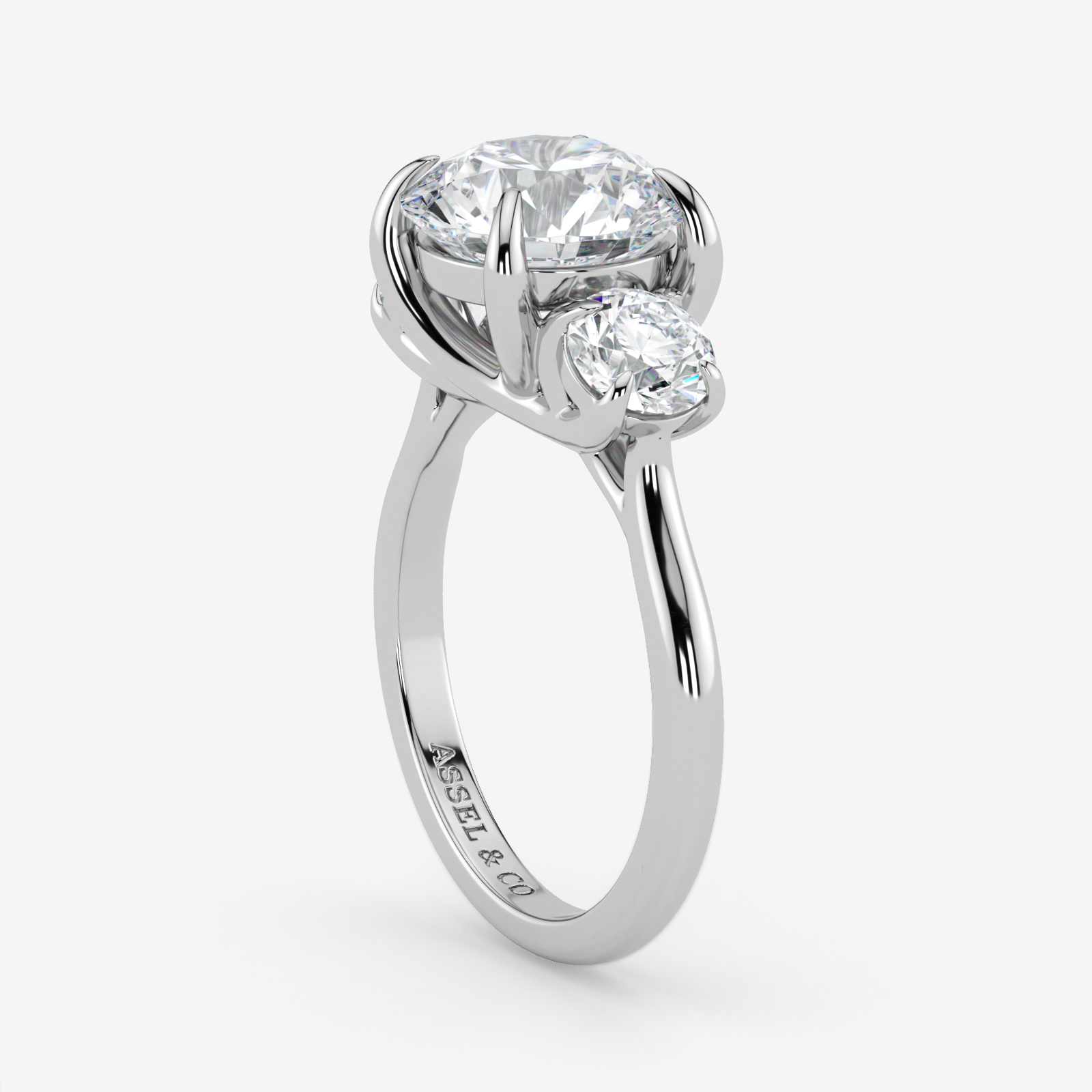 Silver ring with two diamonds on a white background