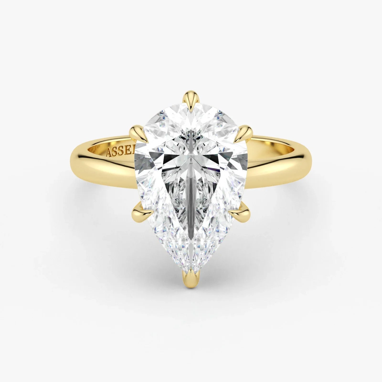 Pear-shaped-lab-diamond-solitaire-in-18K-yellow-gold-by-Assel-&-Co