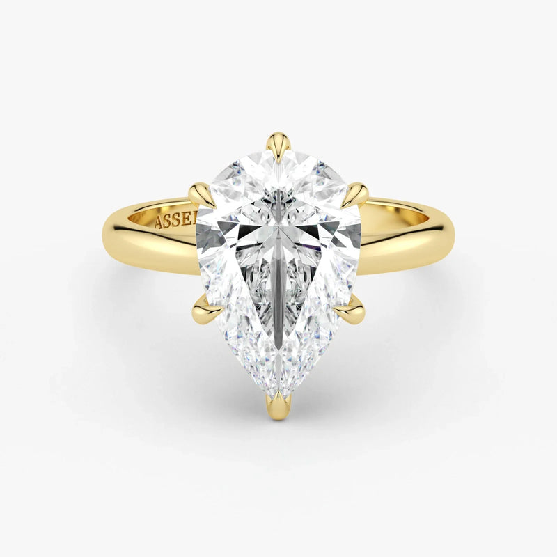Pear-shaped-lab-diamond-solitaire-in-18K-yellow-gold-by-Assel-&-Co