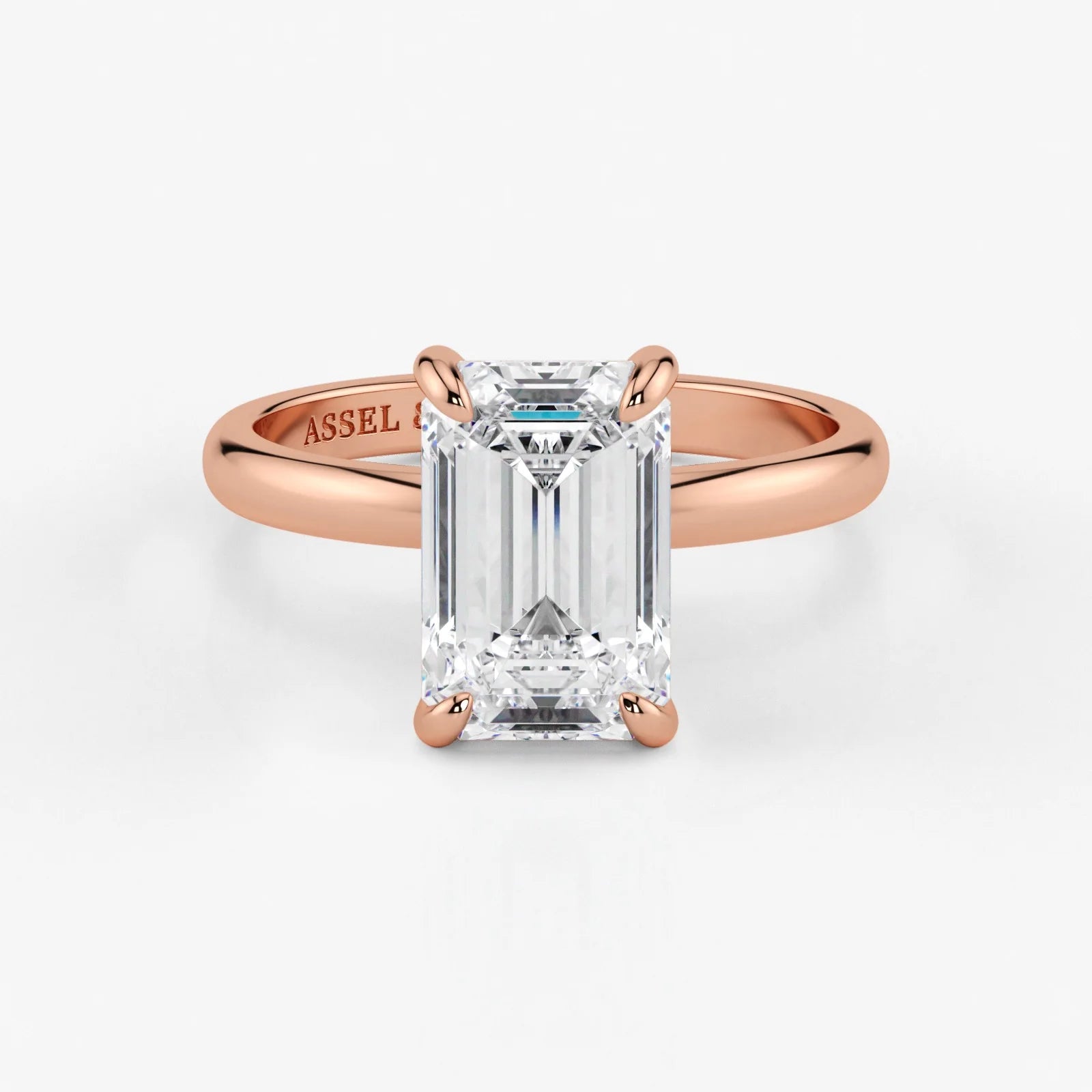 Emerald cut lab-grown diamond engagement ring in 18K rose gold by Assel & Co