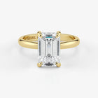 Emerald cut lab-grown diamond engagement ring in 18K yellow gold by Assel & Co
