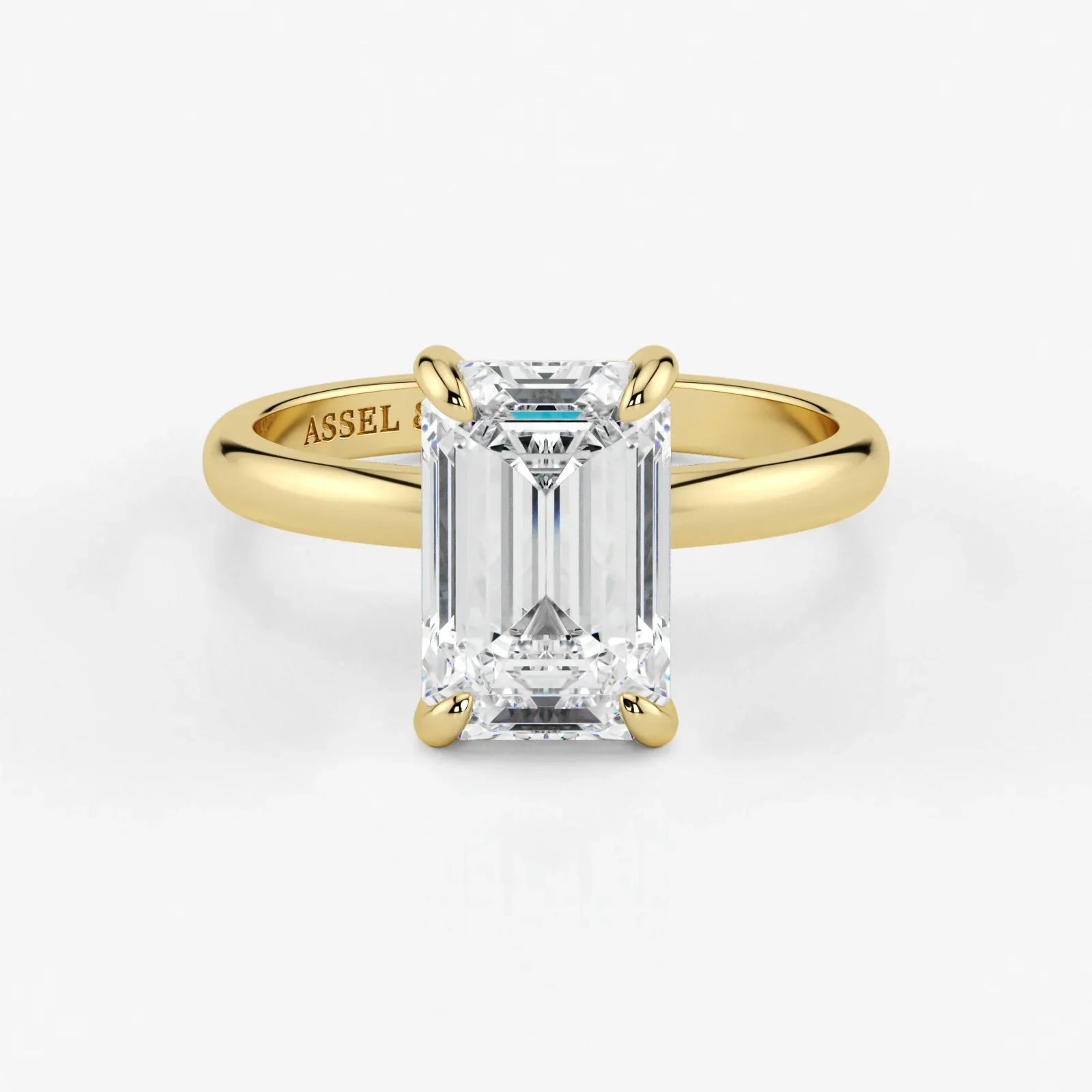 Emerald-cut-lab-grown-diamond-engagement-ring-in-18K-yellow-gold-by-Assel-&-Co