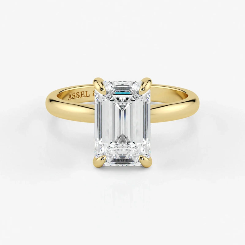 Emerald-cut-lab-grown-diamond-engagement-ring-in-18K-yellow-gold-by-Assel-&-Co