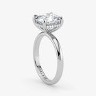 Hidden Halo cushion cut lab-grown diamond engagement ring in Platinum